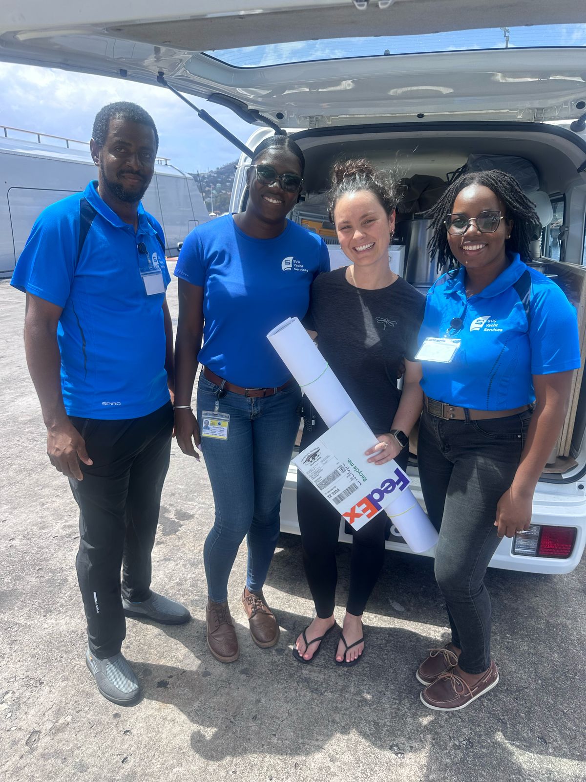 SVG Yacht Services operations team at a yacht delivery